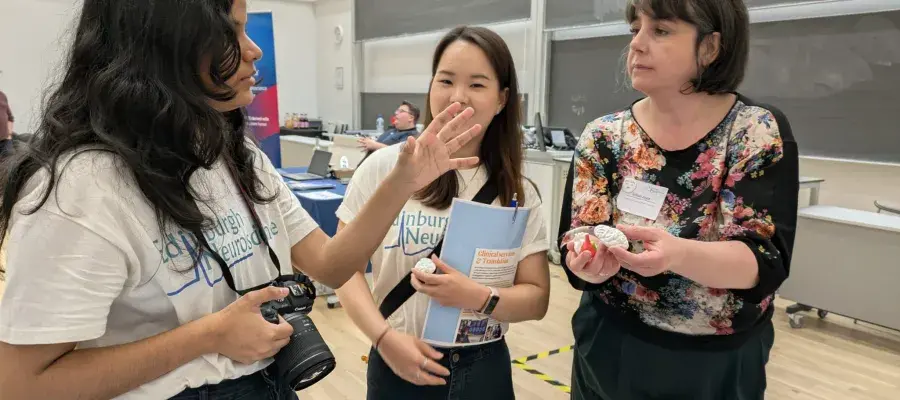 Candid photo of Gillian and colleagues at the Edinburgh Neuroscience Day