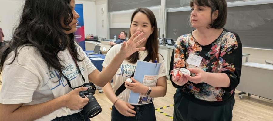 Candid photo of Gillian and colleagues at the Edinburgh Neuroscience Day