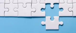 Blue background, white jigzaw puzzles