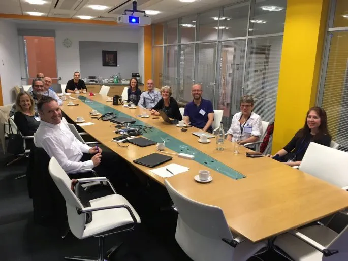 CDP members brainstorm around a table 