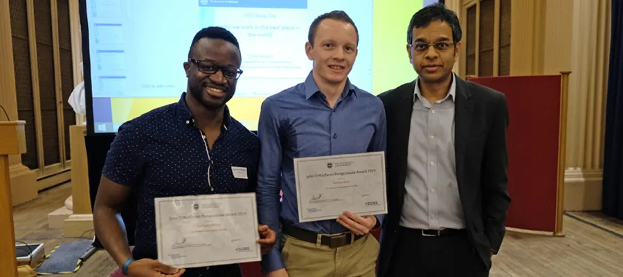Gashirai Mbizvo & Gordon Blair, winners of the 2019 John D Matthews Postgraduate Award, with Professor Siddharthan Chandran