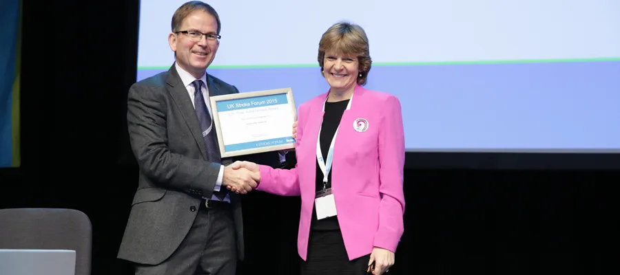 Peter Sandercock receives his award