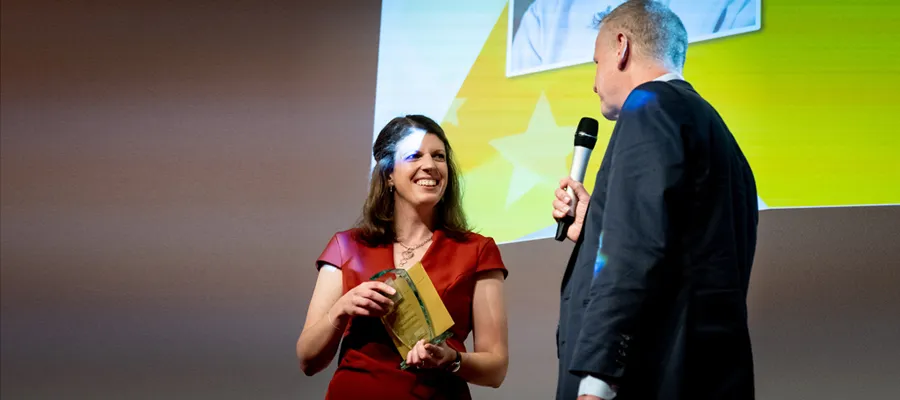 Sarah McGlasson receives her award