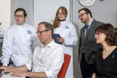 Group looking at computer images