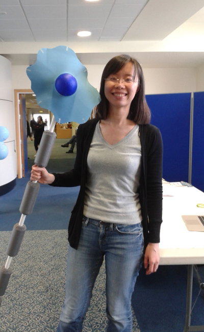 student demonstrating a model neuron